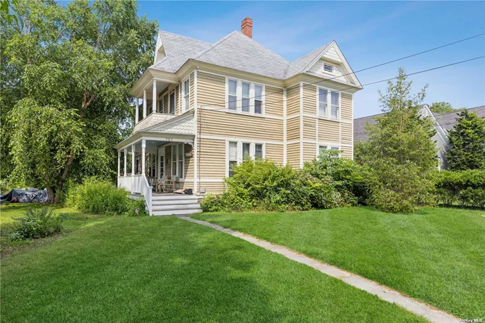 Large 2-Family Victorian c. 1850. Original details, including Hardwood Floors, Porch & 2nd Floor Balcony. Downstairs: LR, DR, EIK w/Back Deck, 2 Generous BD, Laundry Room & Porch. Upstairs: LR w/Balcony, EIK, 3 BD, BA. Close to Sound & Bay Beaches. Close to Downtown Maritime Village w/Shops, Marina & Transportation.