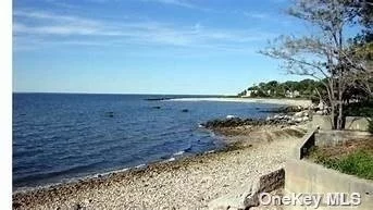 Cleared, Subdivided Lot, Ready for Cottage, Stones Throw Away from PRIVATE BEACH, Perfect Location, (Vacant Land)