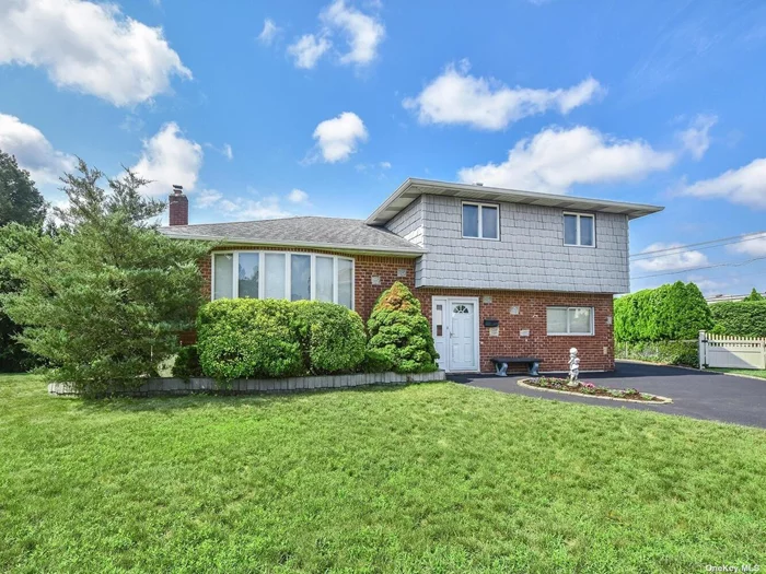 Make this Your Own 4 Bdrm, 3 Full Bath Split in Cul-de-sak with AMAZING Oversized Corner Flat Lot! Hardwd Floors, EIK, Formal DR & LR, Sep Den, Partial Bsmt w/ Laundry & Utilities, & 4th Oversized Bdrm on Main Level w/ SOE and Full Bath - Possible Acc Apt w/ Permits. Newer Siding, Updated Bathrm, Anderson Windows. Detatched 2 Car Brick Garage, Long Driveway and Slate Patio! Perfect Home to Call Yours! Won&rsquo;t Last Long!!!