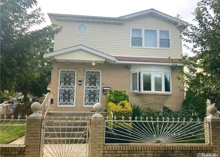 Great 2 Family in Springfield Gardens features 6 Bedrooms, 4 Bathrooms, Finished Basement with outside entrance. Close to major highways, JFK Airport. Close to Near Green Acres Mall.