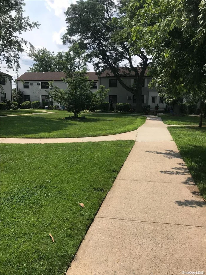 Nestled in a Quaint Quiet Courtyard this One Bedroom Co-op Offers an Updated Kitchen and Bathroom, Living room and Bedroom with custom closets.