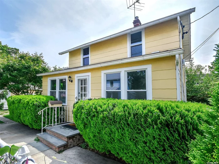 Move in ready Colonial home set on quaint New England street. Newly renovated both inside and out. All new features include the Kitchen, bath, floors, hi-hats, and wiring. Beautifully restored private gardens with new patio. One block from Mill Pond and Manhasset Bay.