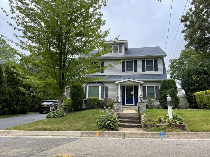 Charming Dutch Colonial in the North Shore School District. This spacious home was totally custom rebuilt in 2001, with extensions, all new electrical, 66k gal septic with 3 ring overflow and two drywalls. Enter this stunning home into a large living room with a gas fireplace, formal dining room, kitchen with custom cabinetry and built in&rsquo;s, gas cooktop and double oven, all with granite counters and new stainless appliances, wine cooler, skylights and mudroom, with an entrance to the back fully fenced in patio for entertaining around the heated covered above ground pool. In ground 4 sone sprinklers, 2 zone central A/C and 4 zone heat with UV lights in the ventilation system. Upstairs you will find 4 large bedrooms with two bathrooms, a master bedroom ensuite with a jacuzzi tub and jetted shower, a laundry room, attic fan with temperature sensor, and many more extras, a must see. Close to schools, shops, LIRR and transportation.