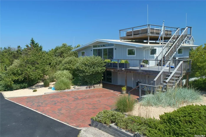 A perfectly renovated mid-century modern beach house with views of the Fire Island inlet for under $1mm!. Your oasis awaits you in this spacious sun-drenched year-round beach house. Spectacularly renovated in 2015, no details were spared! This seaside retreat provides 4 season living or a quick getaway to NYC or a short commute to the LIRR. This home features a huge wrap around deck perfect for entertaining. The roof deck affords both sunrises and sunsets by providing water views of the Great South Bay extending to the Fire island Inlet. You can enjoy one of the private beaches steps away, everyday is like you are on vacation! Babylon town lease extended to 2065. Association fees $800, Ground Rent $4, 000