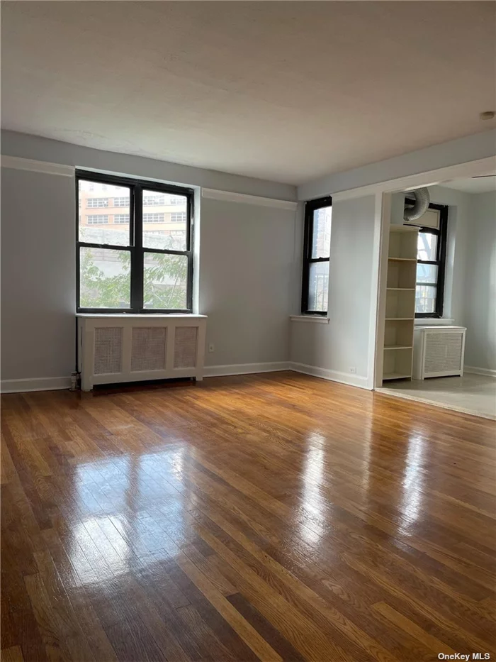 Great Location in Elmhurst, close to all. Sunny 2 bed 1bath apartment. Tenant pays for electricity and cooking gas. Required income check (3X Vs. rent), 700 or above credit score, fully background check(checking fee paid online not refundable), no pets