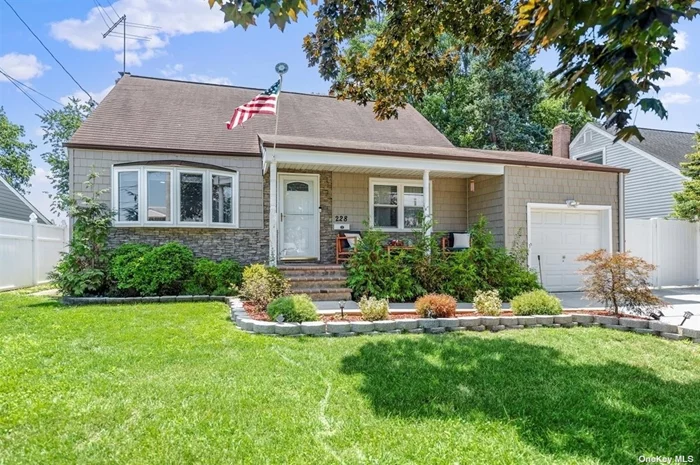 What a Gem! Impeccable detail and craftsmanship in this extended cape featuring 4 bedrooms and 2 full baths. Gleaming hardwood throughout the first floor Living Room, Eat in kitchen with Quartz countertops, formal dining room and bedrooms. Upstairs enjoy two bedrooms and a full bath. Full basement with laundry room and ample storage. Bright, sun drenched newer windows, Ductless AC, Custom window treatments and new burner. Fully fenced backyard with hardscape for entertaining and planting beds. Super clean one car garage. Babylon town amenities include pool and beach access with resident passes. Close to Lindenhurst Village for shops and restaurants. Simply unpack and enjoy.