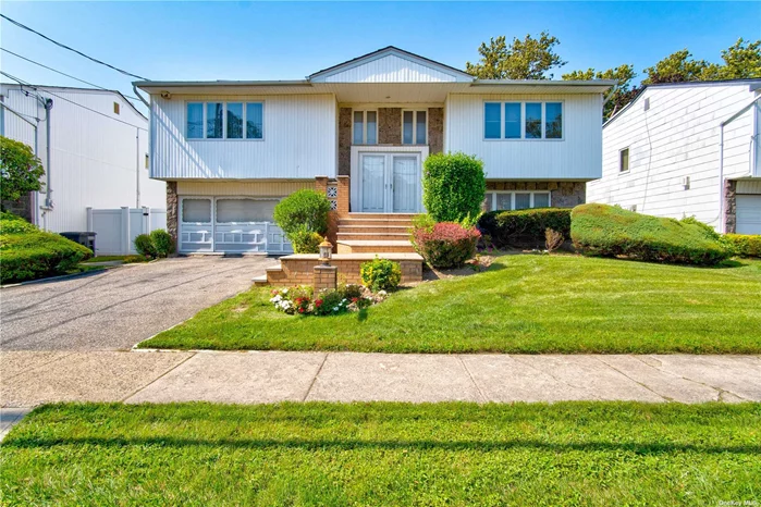 Wide line HI-Ranch in SD#15, the layout has very spacious rooms throughout, bright & sunny, 4 skylights, recessed lighting, hardwood floors, 2 zone gas heat, CAC, back part of the roof is new. Quiet residential street.