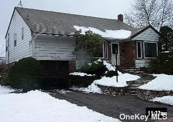 Large front to back split level. This home is being sold AS IS with no representations.