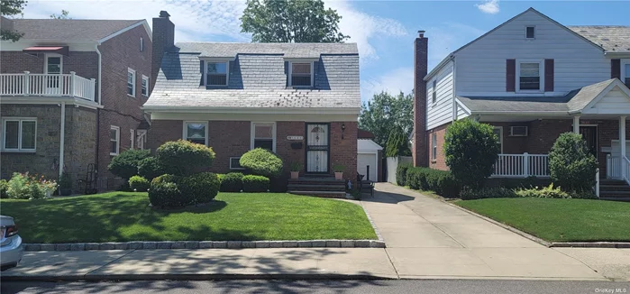 Beautifully Maintained 5 Bedroom / 3 Bathroom Colonial on a Treelined Block in the Heart of Bayside Hills. 1 Car Detached Garage plus Driveway Parking for an Additional 4 - 5 Cars. Fully Finished Basement w/ Separate Entrance.