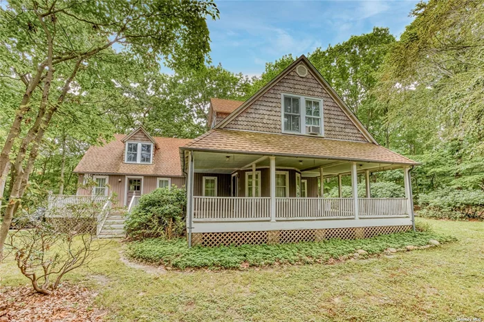 Step right into the possibilities! This charming home built in 1895, is full of wonderful surprises! From the unique architecture, the wrap-around porch,  the numerous skylights and not to mention the beautiful brick original fireplace, in which will delight you! This one of a kind home is larger than it looks and there are plenty of rooms for you to master your vision! The unfinished basement with over 9ft ceilings, has tons of potential and/or great ample storage space. This property features many amenities including: clay tennis courts, barn, chapel , boat house, club house, a private beach and even a community caretaker! The home and community are so very special, and this is a rare opportunity to live in a water-front beach community! So much character and potential. A must see!