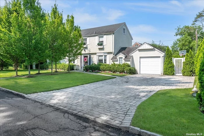 Classic South Strathmore Gem! Main Level Includes Large Formal Living Room/Dining Room With Fireplace, Updated Eat-In-Kitchen With Stainless Steel Appliances, Den And Powder Room. 3 Generous Sized Bedrooms And Full Bath On 2nd Floor. Impeccably Landscaped & In-ground Sprinkler System. New Windows & Hardwood Floors. Convenient To Lirr, Shopping & Dining. Munsey Park Schools & Manhasset High.