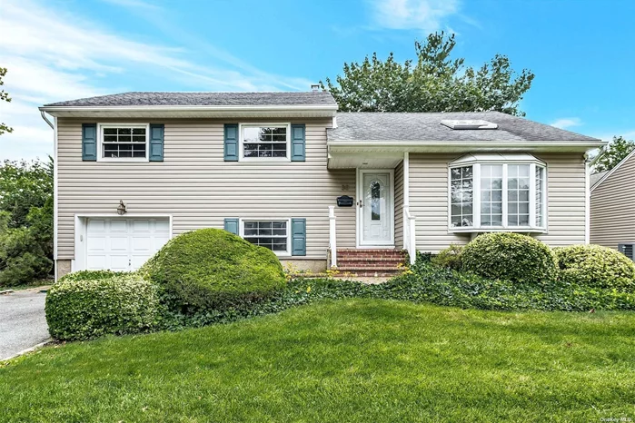 Just move right in to this beautiful 3 bedroom, 2 full bath split with lots of curb appeal and a mid-block location. This well kept home has formal living and dining areas, hard wood floors, an expanded EIK, Anderson windows, newer central air, GAS heat, ensuite master bedroom, and the Syosset School District- Robbins Lane Elementary School- Thompson Middle School- Syosset High School. Ask agent for exclusion.