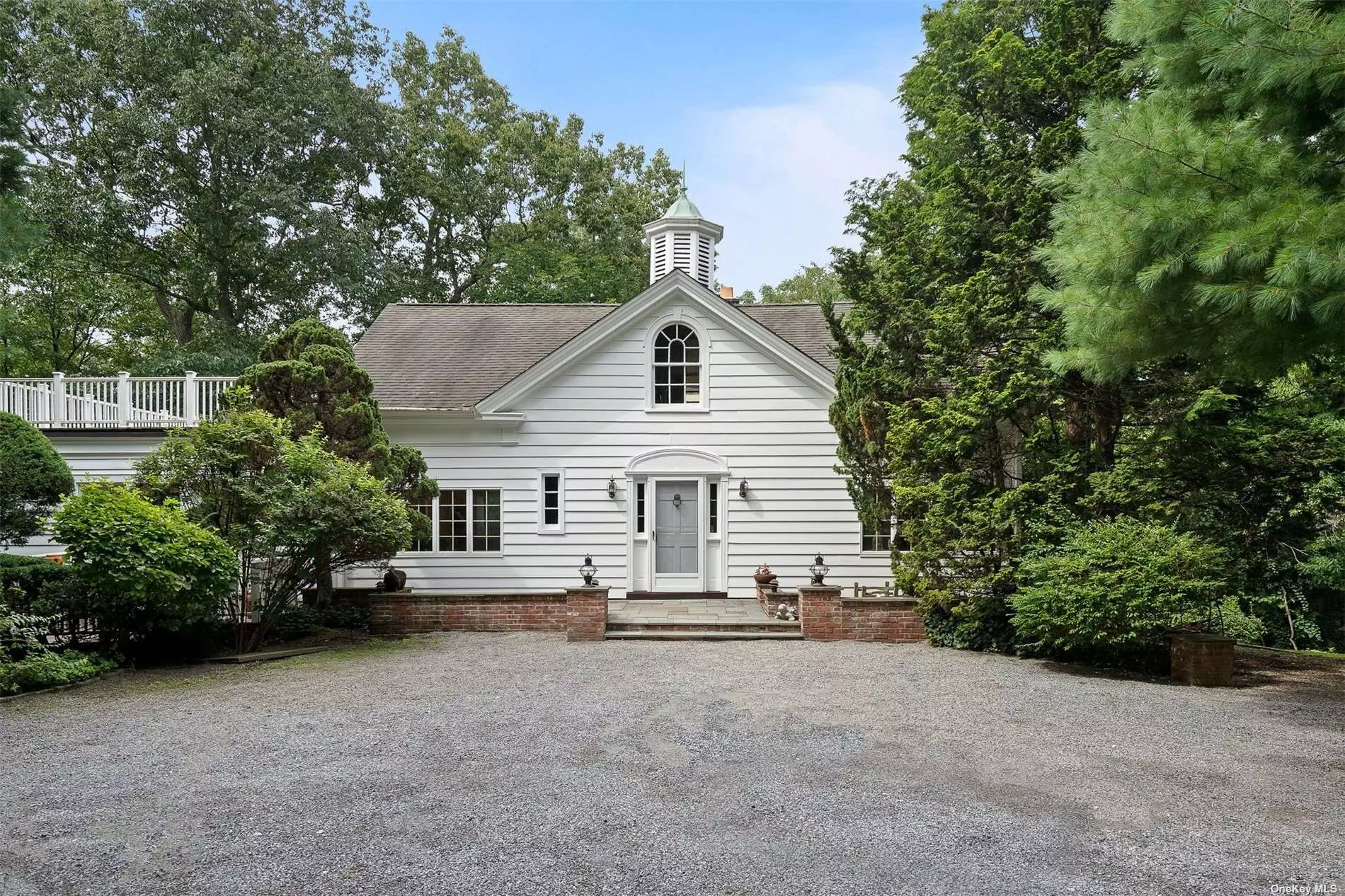 Original 1910 Carriage House Carefully Restored To Todays Lifestyle. Large Living Rm/Dining Rm With Wood-Burning Stove, Terra Cotta Floors And Original Bead Board, Country Kitchen With Sunny Great Room and Eating Area. Multi-Level Living Areas. Handcrafted Oak Library, Large Master Suite With Marble Bath, Jacuzzi And Private Deck. Beautiful Setting Overlooking 2 Wooded Acres. Whole House Generator and Water Filter. Newly Paved Private Lane. Laurel Hollow Beach and Mooring CSH SD#2.