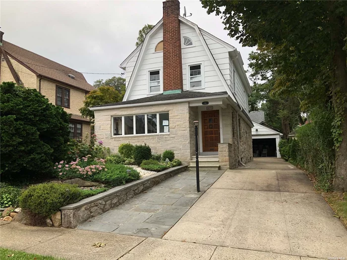 Great potential! Ready to remodel to your liking! This beautiful home with Stone & Cedar exterior, very well Landscaped with a deck off the Kitchen sliding doors, is located on a very quiet dead end street in Great Neck with Lakeville elementary and Great Neck South High Schools, Parks, Tennis & Pools, High ceilings, large open Attic, with staircase & dormer, large basement with utility & laundry rooms with 1/2 bath