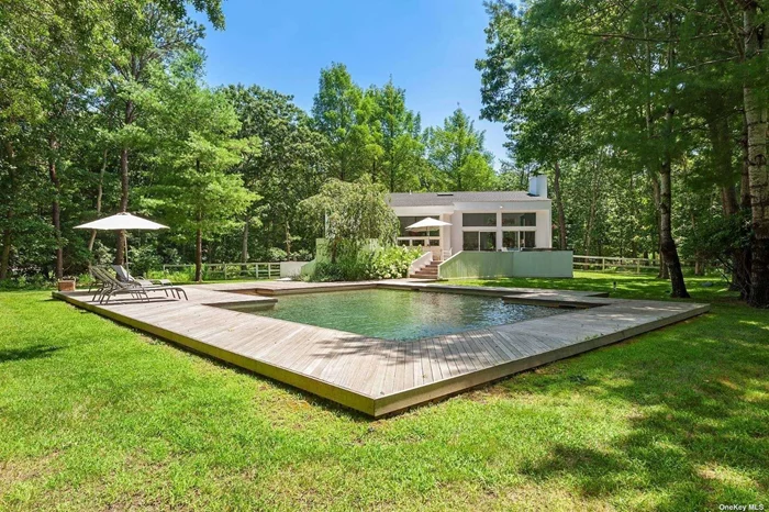 Private oasis South of the Highway in Wainscott. Completely renovated and upgraded with top of the line appliances and finishes for your summer relaxing and enjoyment. Modern open concept on a cul-de-sac location, 1.2 acres of land, this beautiful elegant house features 4 bedrooms, 3.5 bathrooms with a lower level in-suite with separate entrance. Enjoy the park-like outdoors with ample decking and seating lounge area, heated pool, close to the ocean beaches and Villages, ideal for entertainment. Available for September/October and extended season upon request.