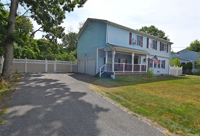 Relax on the porch of this Spacious expanded 4 BR colonial Located on a quiet street and enjoy the beautiful water view. Located Close to Town park, Beaches & downtown Center Moriches. Features formal dining room, eat in Kitchen w granite counter tops and brand new refrigerator, first floor laundry, multiple huge walk in closets and a cozy nook upstairs perfect for study or family room. Spacious fenced backyard, full basement and 1+ attached garage.