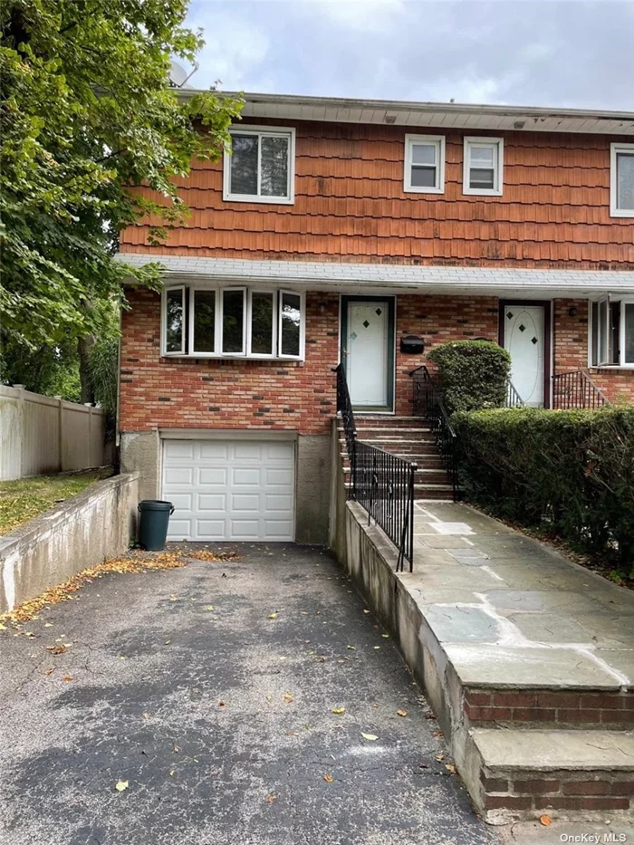 Semi-Detached 2 Family Home. Bright & Airy In Excellent Condition. Well-Sized 3 Bedrooms With 2.5 Bathrooms. Formal Dining Room, Living Room, One Car Garage, Finished Basement. Great Neck South Schools, E.M. Baker Elementary. Close to Great Neck LIRR, Shopping, Dining And So Much More!