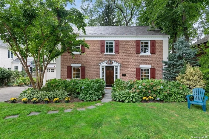 Beautiful South facing 3 Bed, 2.5 bath Center Hall Colonial located in the heart of Manhasset, minutes away from shops, restaurants, country clubs and LIRR. The property sits on a well-manicured lot on a double dead-end street. The first floor features a large formal living room with wood burning fireplace, a powder room, and a formal dining room. Beautiful eat-in kitchen with granite countertops, large center island and stainless-steel appliances. A sunroom leads to a large deck and tranquil backyard. Hardwood floors throughout. Winding staircase leads to the second floor which features primary bedroom with en-suite bathroom and build-in reading nook overlooking the front yard. Two additional bedrooms and a full bath. Full basement features the utility/laundry room and additional bonus space. The property is very well kept and updated, slate roof, beautiful working shutters, ductless air conditioning, 200 Amp electrical, security system, sprinkler system and more. A must see!