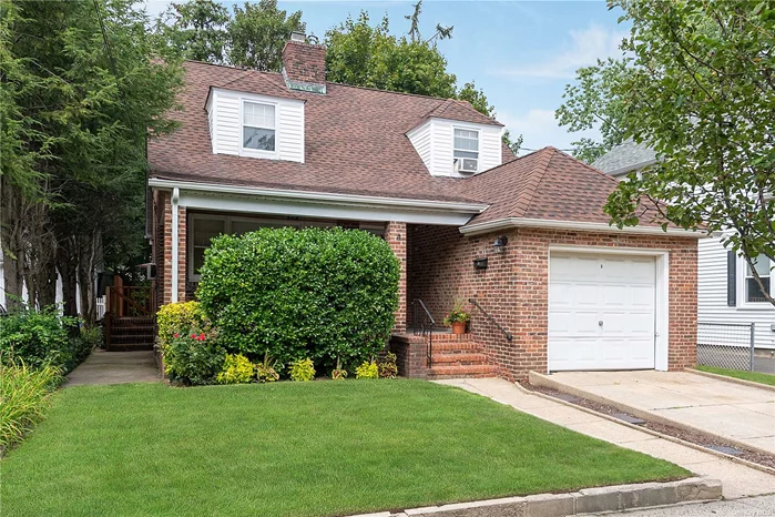 Welcome to this beautiful 4 bedroom, 2 bathroom brick cape in the desirable Park Section of Port Washington! As you approach you are greeted by a spacious covered open porch with cedar planked ceiling. The main level unfolds with a living room/dining room combo with wood burning fireplace, eat in kitchen with updated appliances, fully renovated bath & 2 bedrooms. Second floor features 2 generous sized bedrooms and full bathroom. Recently renovated basement with new vinyl flooring, oil to gas conversion in 2014 with energy efficient gas boiler, and new hot water heater. Private rear yard with large paver patio. Convenient to shopping, train and highways. Great location! Low Taxes!