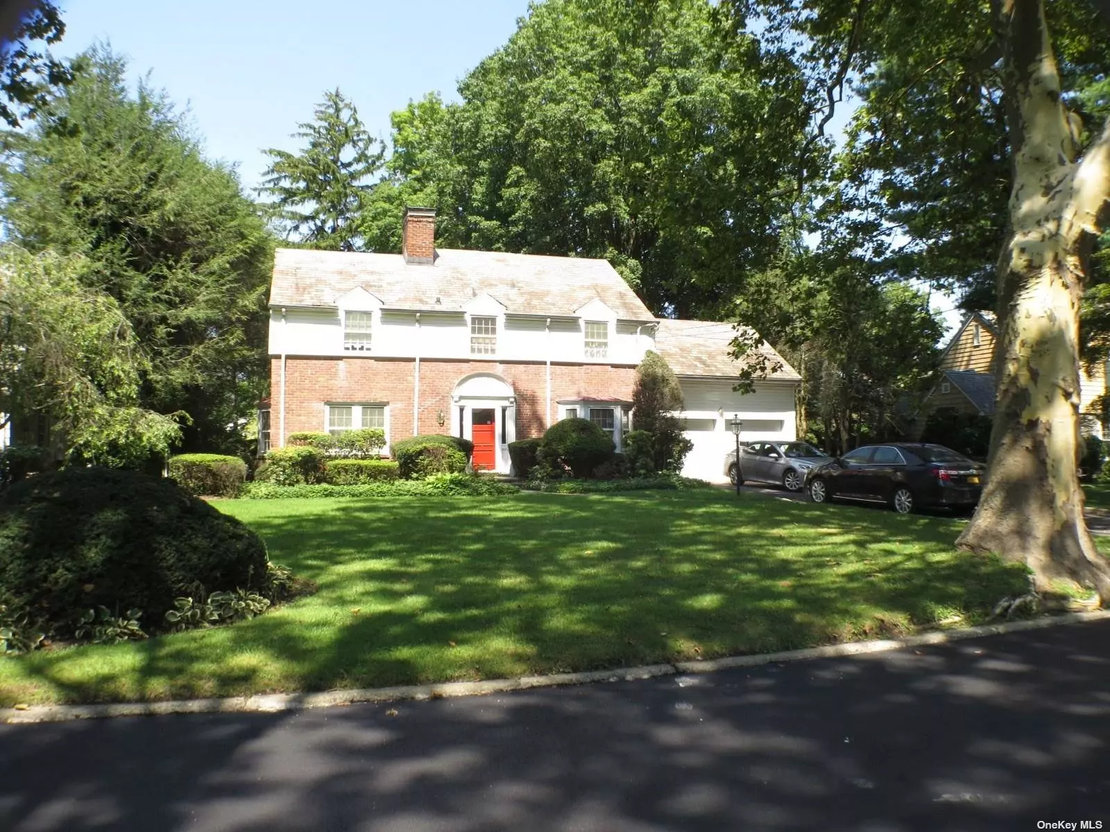 TEMP OFF MARKET  Lovely old world charm in this beautiful center hall colonial with TWO master suites at either end of the second floor, each with its own staircase for access AND full en suite bath.   Two more bathrooms and a common full bath completed the second floor of this traditional colonial (yes THREE full baths on second floor)   Main floor great for entertaining with excellent flow and many possibilities for upgrades and modifications.