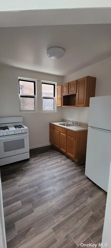 Renovated Two Bedroom Apartment For Rent. The Unit Features Separate Kitchen, Updated Bathroom, Beautiful Floors, Lots of Natural Light, and Lots of Windows. Just Block From the Train at Jamaica Center. Steps Away From Shopping and Amenities.