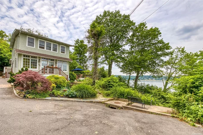 Fabulous Sun Filled Waterfront Home With Panoramic Water Views Of Sunrise & Sunsets Across Long Island Sound w/Easy Access To Sea Cliff Beach & Boardwalk. The Heart Of This Home Is An Expansive Open Kitchen, Dining Room & Living Room w/French Doors Connecting The Oversized Deck Surrounded By Specimen Plantings & Unobstructed Water Views For Entertaining. This Home Features Hardwood Radiant Heated Floors, Generac Generator, Central Vacuum & Central Air. Perfect Secluded Retreat For Year Round Living Or Simply A Weekend Getaway!