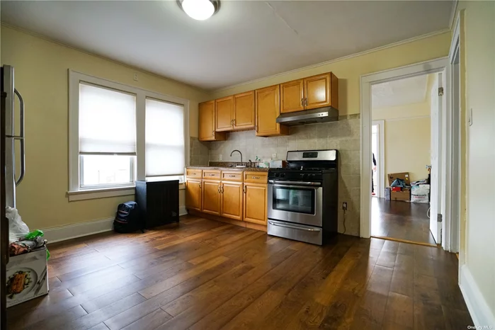 Oversize Sun-Drenched 2FL Apartment of 850 sqft. Features hardwood floors throughout, Large Eat-In Kitchen, you can fit a dining table in it. Bedrooms can fit kingsize bed and queens size bed.