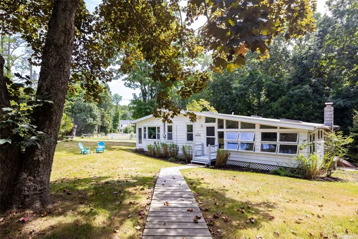 Charming cottage in one of Southold&rsquo;s most desirable neighborhoods. This 3 bed, 2 bath home features an open floor plan with ample room for indoor / outdoor entertaining and a private setting just a half mile from beautiful sound beaches. Close to farm stands, wineries and a short drive to Greenport village or downtown Southold.