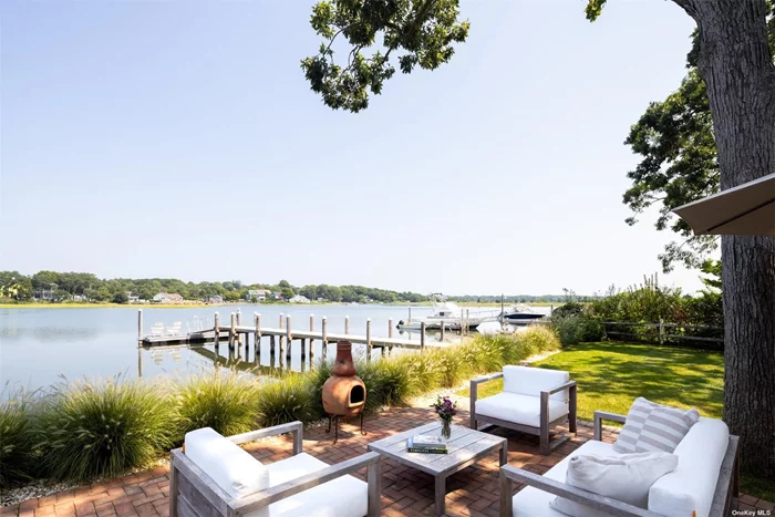 Charming cape set on a spacious and beautifully landscaped waterfront property. Minutes from downtown Southold and steps from your association beach, the home features four bedrooms, expansive water views, outdoor shower and room to expand. Brand new top of the line dock with water and electricity includes a large landing for boaters and the ideal spot for morning coffee or evening cocktails. Quick and easy access to the bay for prime boating destinations around the east end. Perfectly designed for indoor/outdoor entertaining with quintessential North Fork charm.