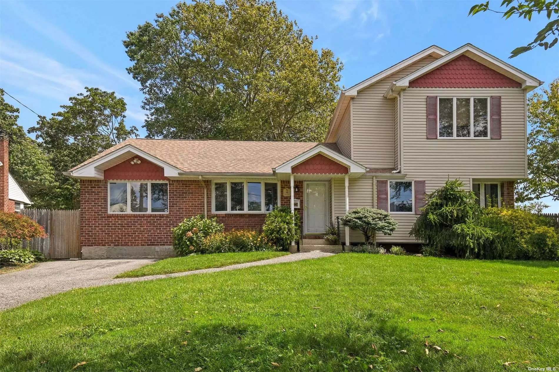 Quiet mid block loc in the Elwood sd which won the Blue Ribbon award. 2nd floor was added on in 2004 as well as conv the gar to a den and a mud room was added with a door to backyard. There is gas on the street. Cac. 2yr old hot water heater & new above ground oil tank. Igs w/ 6 zones. Large yard, plenty of room for a pool. Cesspool loc in front. Kit done in 2000 with new laminate floor, sink, faucet & s/s appl (except fridge). Roof 2004. Maint free vinyl & brick siding. Fin bamt. Main bath upd. Raised panel door w/new hardware. Up bath 2004. Upd windows 1993 and forward. Andersens and vinyl. Den w/ rec lighting & mud rm with door to backyd. Neutral decor. Inside freshly painted.