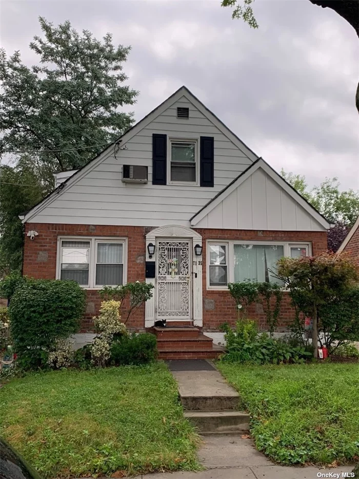 Mint condition home in heart of Fresh Meadows! The third bedroom is massive and can be easily converted to a fourth bedroom! New stainless steel refrigerator, new stainless steel dryer, new washer and dryer, new gas burner and new water heater. There is a large finished basement that has separate entrance. This home boasts large bedrooms and hardwood floors.  Lovely backyard with deck; long private driveway with detached garage. Excellent schools, proximity to houses of worship, transportation, and shopping. Lovely block. This house will not last long! All information deemed reliable; However, broker assumes no responsibility for information provided.