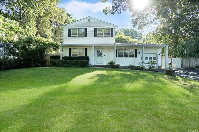 Great opportunity for Nice Size Colonial with Large Private Yard/ Wood Floors