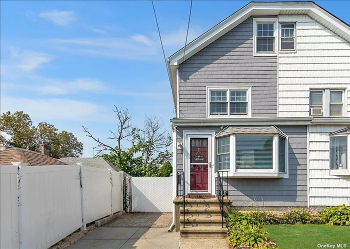 Super Unique Semi-Detached Colonial in Prime Bayside! This Renovated Home Features a Living Room with Vaulted Ceilings, a Formal Dining Room, New Kitchen with Granite Countertops, Stainless Steel Appliances, and Sliders to a Sun Soaked Yard with Pavers. Three Bedrooms, and a Full Bathroom Upstairs, Plus a Pull Down Attic That Can Easily be Converted into Two Bedrooms. The Open, Full Finished Basement Offers Ample Storage Space and a New Half Bathroom. 3 Zone Gas Heat, All New Andersen Windows, and a Private Driveway with a Detached Two Car Garage. Conveniently Located Just Blocks from Schools, Shops, and Transportation.