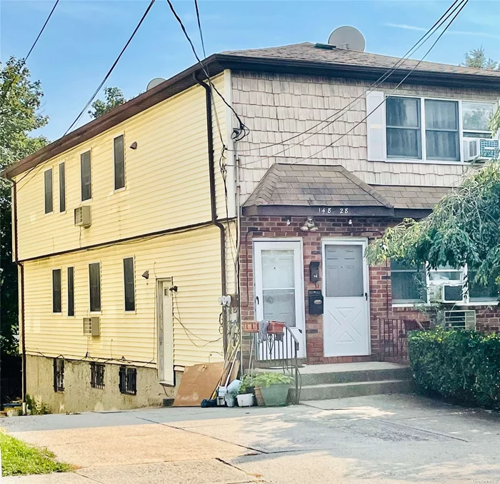 Rare Find 2 Family Home nestled in the heart of Briarwood. Investors Delight! 6 Bedrooms, 3 Full Baths and 2 Half Baths with Huge finished Basement with an outside entrance. 3 Blocks away from Subway. Built 1987, Private Driveway that can accommodate 5 cars, Private Backyard,  Close to all.