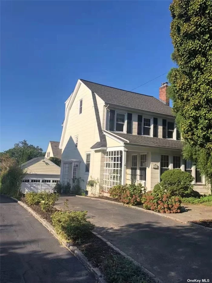 New Renovated Sun-Drenched 5 Bedrooms Residence located on a Beautiful Tree-Lined Street. Living Room With FPLC. Wall of windows in the Den/Office, Formal Dining room with Access to the Private Yard. 2 Car Garage with Long Driveway.