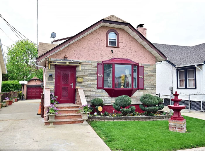 Enter this well-maintained and updated home through a windowed foyer/mudroom. Updates are inside and outside. Immaculately landscaped with a working waterfall in the front yard. Newer granite kitchen is tastefully done. Pristine original wood floors. 2 bedrooms on the main level, cozy living room with wood-burning fireplace adjacent to the formal dining room. Fully finished basement with wet bar and half bathroom. Manicured back and front yards. This home is a must-view home awaiting new homeowners to love it as much as the current homeowner.