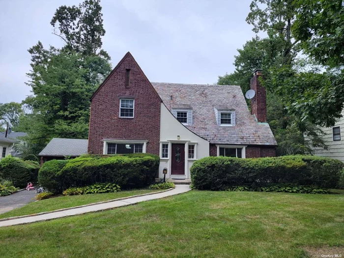 Picturesque Brick Tudor With Vermont Slate Roof On A Desirable Quiet Cul-de-Sac and Total Privacy with Lush Flat Property. This True Charming Home Featuring Four Bedrooms, Three Full Bathrooms, Spacious Living Room with Fireplace, Formal Dining Room, Granite Eat-In-Kitchen. Gas Heat and Central Air Conditioning. Baker Hill Elementary School and Great Neck North Middle and High Schools. Enjoy all the Amenities of Great Neck Park District.