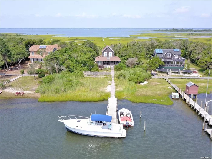 A classic Great South Bay Cottage ready for your family to renovate and enjoy the unique island lifestyle! Oak Island is a true island, completely surrounded by water and only accessible by boat. A beautiful place for summer fun on the Great South Bay. Cottage definitely needs some sprucing up, but it&rsquo;s a great opportunity to secure your spot in this Brigadoon. There is no electricity or other utilities on the island.Not eligible for traditional financing.