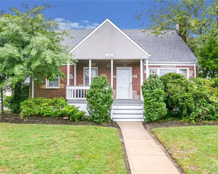 Water View Cape in the American Venice section of Lindenhurst. Charming Corner Property with outside entrance from basement to side street. Huge 120x100 lot. Sit on the front porch and marvel at the beautiful Water View. The first floor has a lovely hardwood floors in the Living Room and Dining Room. The kitchen has access to the backyard patio and oversized yard. Two spacious bedrooms and bathroom finish out the 1st floor. 2nd floor has two larger size bedrooms and a full bathroom. The full basement is a clean slate and has an outside entrance, unlimited possibilities.