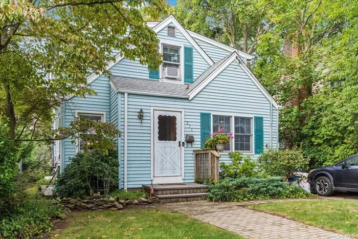 This perfectly cozy 3 bedroom, 1.5 bath 2-Story cape is located mid-block and features a gorgeously updated Eat-In-Kitchen with granite countertops.Walk into a timeless living room with a unique wood-burning stove.A screened in porch, den, and half bath complete the first level. On the second level The three bedrooms include a primary bedroom with an attached office or possible nursery. Hardwood floors throughout, updated appliances, partially finished basement with billiard room, spacious backyard and detached 1-car garage. Oceanside Schools.