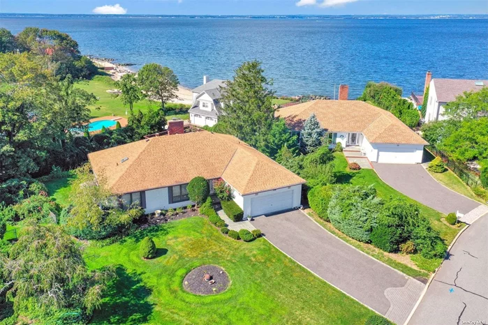 Fabulous Opportunity to live in the Oak Neck Point Private Beach Community in Bayville.  This 3 Bedroom 2.5 Bath Ranch Has Amazing Light and Bright Rooms with Water Views of the Long Island Sound. Located Only 2 Homes from the Water The House Has a Relaxing Feel with Walls of Windows, Cathedral Ceilings, and a Premier Suite with Dressing Area and Walk In Closet which Leads to the Full Premier Bathroom. Granite Kitchen and Family Room with Wood Burning Fireplace Both Have Water View. This is a Special Home and One You Wont Want to Miss Out On. Part of the Harrison Woods Homeowners Association $455 annual dues.