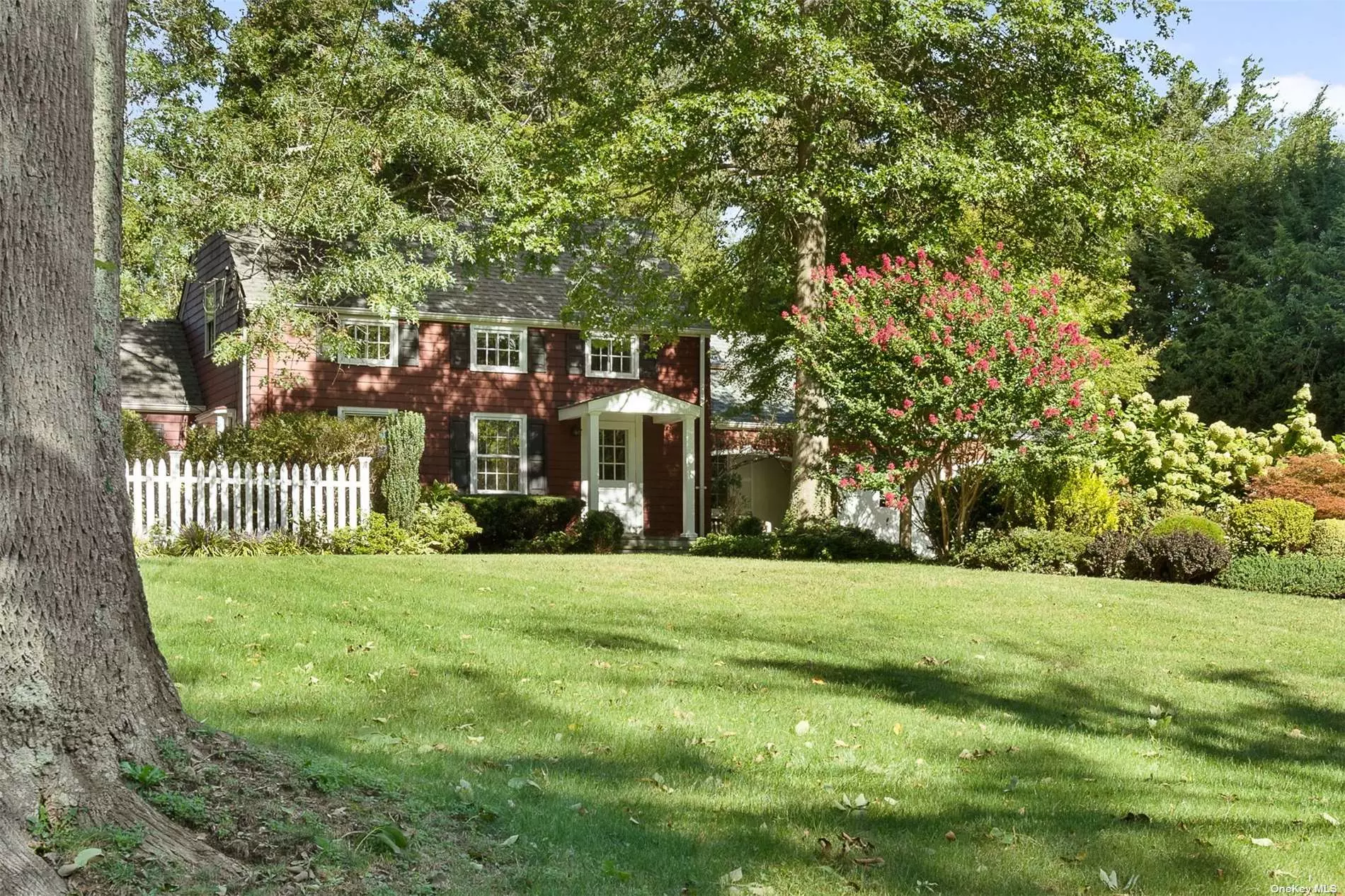 Welcome to this Charming Cape Beautifully Situated on .75 Acres in the Heart of Huntington, Bordering Lloyd Harbor. Traditional Detail, Old World Millwork, and Wide Plank Oak Floors Color this Wonderful Find. Perfect for the Buyer who Seeks Warmth and Architectural Character.  The Three Season Porch Opens to the Thoughtfully Landscaped Grounds with Specimen Plantings and Mature Trees for Ultimate Privacy! Minutes to Lovely Local Beaches and Boating Activities. Huntington SD #3.