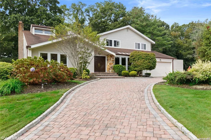 Welcome home as you drive up a circular paver driveway to this perfectly positioned/inviting colonial in Muttontown Knolls. Enter the grand entrance of this expanded home to a 5 yr young kitchen and adjoining butlers pantry with sink, walk in pantry, & quartz center island .Wood flooring throughout. Family room with fireplace , grand primary suite features dressing area and 2 walk in closets , ensuite bathroom with jetted tub and separate shower , large bedrooms upstairs and a main floor bedroom/office with adjoining Jack & Jill bathroom for extended family. Specimen plantings surround this private 1/2 acre and expansive multi-level Trex/composite decking .