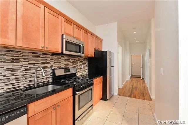 LEGAL 2 FAMILY in Cypress Hills, Brooklyn with Excellent Rental Income!!! UNIT ONE is a Duplex with 3 Large Bedrooms and 2 Full Baths, Open Concept Kitchen with Large Walk-In Pantry, Hardwood Floors, High Ceilings, Washer/Dryer, Large Walk-In Storage, and a BEAUTIFUL PRIVATE BACKYARD!!!  UNIT TWO has 2 Bedrooms and 1 Full Bath, Open Concept Kitchen, High Ceilings with Skylight, Walk-in Closet, Hardwood Floors. This house is Great for an END USER or an INVESTOR looking to rent out the whole house. Updated Electric, Plumbing, 2 Separate Boilers, 2 Hot Water Tanks with separate gas and electric meters for each unit.  Close to Highland Park, all major transportations, airports, shops, restaurants and more.
