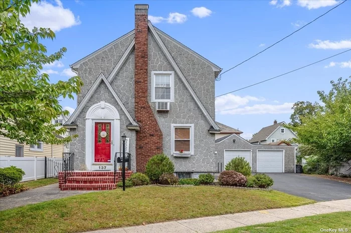 New to market! Enchanting, Inviting, and Warm Tudor Colonial Offering 3 bedrooms 1.5 baths, Large Eat in Kitchen, Formal Dining Room and a Living Room w/Fireplace. The 2 car detached garage provides bonus space with a side enclosed screened-in porch.