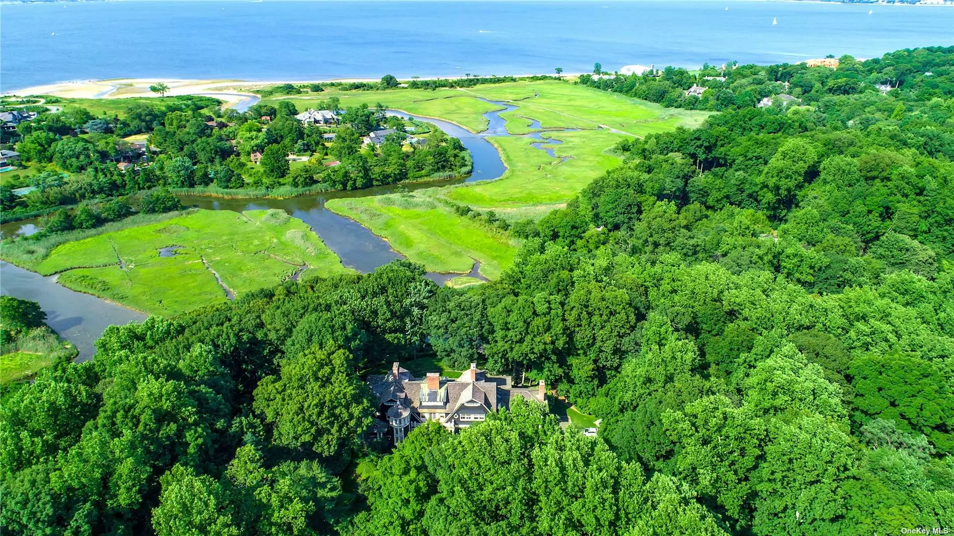 Osprey Landing is an incredible compound including a custom built architecturally crafted 12, 000 sq. ft residence designed by Shoppe Reno Warton Associates and a picture perfect landscape palette on almost nine acres offering panoramic views of the sound, salt marshes and meadows designed by Oehme Van Sweden Associates. In addition, there is a heated saltwater pool with cabana/kitchen and bath. Located in the Inc. Village of Sands Point with private police, sanitation and access to membership at the Village Club of Sands Point with golf, tennis, pool, dining and event space. (2022 taxes to be reduced)