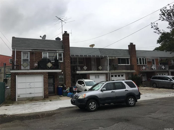 2family semi-attached townhouse with attached garage, near Auburndale Lirr Train station, close to shopping mall, and school.