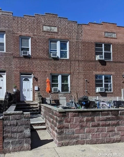 Brick attached 2 family home. Hardwood Floors, 2 car garage + 2 parking spaces, close to transportation and highways to Manhattan and Brooklyn.