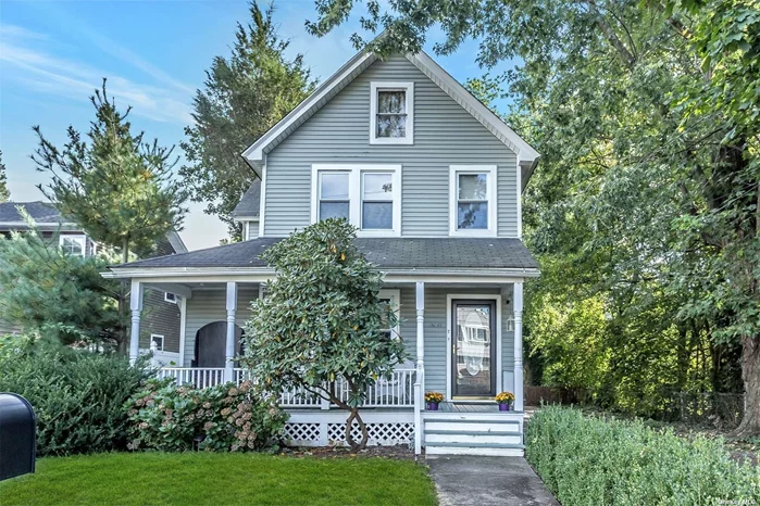 Lovely Victorian Style Colonial with charming front porch. The front foyer opens to a large living room with sitting area. The formal dining room is open to the eat-in kitchen with a back door to the yard. A front stairway leads to the master bedroom and full bath. There are four additional bedrooms, a hall bath, and a back stairway. Walk-up attic, basement, and attached 1 car garage. Great backyard. Close to East Norwich and Historic Oyster Bay.