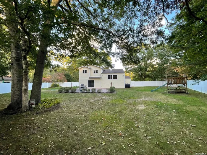 Magnificent, updated and well maintained 4 bedrooms, 3 full bathroom expanded Colonial on corner lot in Simmons Estates. Large blacktop driveway with cobblestone border and paver skirt. This home features a bright open floor plan and spacious kitchen with granite countertops and stainless steel appliances, wiht lots of cabinet and counterspace, and breakfast bar. Den with wainscotting and slider out to patio, formal dining room and huge formal living room on separate level. First floor full bath with glass stand up shower. Formal living room with vaulted ceilings and ceiling fan. The second floor features a master suite with spa bath, separate shower and walk in closet. 3 additional large bedrooms and a full bathroom. Hallway bath with tub and glass shower. Finished partial basement. 2 Car Garage. Resort style backyard with pavered patio and hot tub great for entertaining. Central Air Conditioning. PVC fence